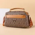 Stylish brown monogram crossbody bag with top handle and comfortable shoulder strap for women. - LCN Letters