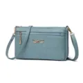 Blue-grey crocodile texture cross-body bag with bow and zipper pockets for women daily use. - Castle Blue