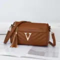 Women fashion brown pillow crossbody bag with metal V logo and stylish tassel pendant. - Yellow Brown