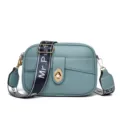 Light blue PU leather women crossbody bag with wide strap and turn lock closure. - Castle Blue