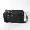 Black leather crossbody pillow bag for women, large capacity commuter shoulder bag with wide strap. - Double Heart Logo Style / Black