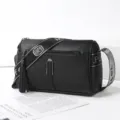 Black leather shoulder bag with wide strap and tassel, casual commuting pillow bag for women. - Classic Litchi Pattern Style / Black