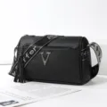 Black leather shoulder bag casual crossbody pillow purse with wide strap and tassel. - V Logo Style / Black