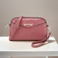 Women pink leather crossbody bag mini shoulder handbag with bow accessory casual purse. - Pink
