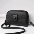 Black mini crossbody bag with multi-zipper compartments and front flap pocket for daily use. - Castle Blue