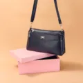 Stylish women's PU leather crossbody shoulder bag in dark blue with chic butterfly clasp. - Dark Blue
