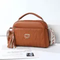 Brown PU leather women handbag with top handle, tassel charm and stylish shoulder strap. - Yellow Brown - Double Heart