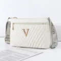 White quilted crossbody bag with metallic V logo and patterned strap for women daily use - Off White
