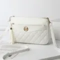 White quilted crossbody bag for women, featuring a tassel charm and a chic metal M logo accent. - Off-White - Heart Embroidered Bag