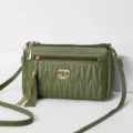 Green soft leather crossbody bag with tassel and double heart metal decor for women. - Army Green