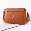 Women brown crossbody bag PU leather quilted shoulder bag with metal V logo for daily use. - Yellow Brown