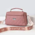 Stylish pink quilted women's shoulder bag with chic crossbody strap and elegant handle. - Oak Red