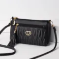 Black Quilted Crossbody Bag for Women Soft Leather Messenger Bag with Tassel and Gold Heart Charm - Black