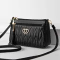 Black quilted women crossbody bag with gold heart hardware and tassel zipper daily shoulder bag - Black