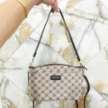 Stylish women monogram shoulder crossbody bag with multi-layer compartments and secure zippers. - White Letters