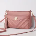 Pink soft leather cross-body shoulder bag with stylish tassel and multi-layer design. - Oak Red