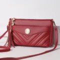 Red multi-layer faux leather crossbody shoulder bag with tassel and gold hardware - Jujube Red