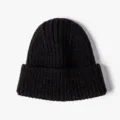 Stay warm and stylish this winter with our classic black ribbed knitted beanie hat. Comfortable fit. - One Size / Black