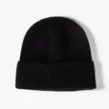 Solid black knitted beanie for men and women, classic cuffed winter warm casual wool hat. - One Size / Black