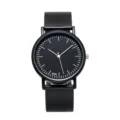 Minimalist black quartz watch featuring sleek dial and comfortable strap for daily use. - Small Scale Model Black Dial