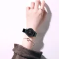 Minimalist black wristwatch detail shot, elegant daily wear accessory for student and fashion lovers. - PVC Dots Small Black Dial