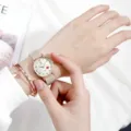 Schicke minimalistische Nylonarmband-Quarzuhr fuer Maedchen mit roemischen Ziffern Armreif. - Gebrochenes Weiß
