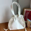 Minimalist white canvas drawstring bag, casual Japanese style bento tote for daily use. - White