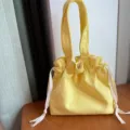 Simple yellow canvas drawstring handbag, cute daily lunch tote bag with convenient closure. - Light Yellow