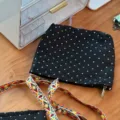 Black polka dot crossbody bag with colorful woven strap, casual commuter small square bag style. - Horizontal / Black Polka Dot