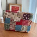 Colorful patchwork corduroy cosmetic bag, large capacity portable travel makeup storage pouch. - Large Capacity Portable / Floral Patchwork Cosmetic Bag