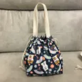 Süße japanische Bento-Tasche mit Shiba-Inu-Muster, Kordelzug-Tragetasche für das Mittagessen. - Fächer Hund Blau