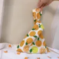 Detailansicht der japanischen Stoff-Handtasche mit Orangenmuster und Knoten-Griff-Design - Große Mandarine