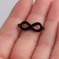 Black stainless steel infinity symbol jewelry connector charm for DIY crafts detail. - Black