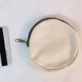 Runde Segeltuch-Münzbörse mit Reißverschluss, schlichte Stoff-Geldtasche für DIY-Design. - Cremeweiß