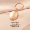 Rose gold oval locket keychain, 316L stainless steel photo frame pendant for custom DIY gifts. - Oval Locket / Rose Gold