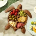 Wooden turtle charcuterie platter, creative partitioned fruit serving tray for kitchen picnic decor. - Turtle Fruit Plate