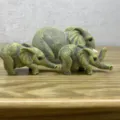 Cute miniature elephant figurine set, realistic animal sculpture ornament for home desk decor. - New Elephant Set / 4 Pieces / Gold