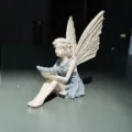 Resin fairy garden figurine statue detail view, decorative outdoor sculpture ornament. - Angel Bird Feeder