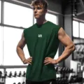 T-shirt sans manches vert foncé pour homme pour l'entraînement de fitness et sport. - Vert Foncé