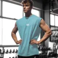 Débardeur de fitness sans manches respirant pour homme, t-shirt de sport ample pour l'été. - Bleu ciel