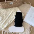 Effen gebreide beenwarmers voor dames, stijlvolle zwarte stijgbeugelsokken voor de herfst. - Eén maat / Zwart