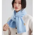 Light blue knitted scarf for women, cozy winter neck warmer with ribbed ends, stylish daily wear. - Blue