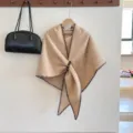 Beige knitted cape shawl for women, warm thick winter wrap with dark brown stitching and buckle. - Khaki