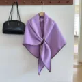 Purple thick knit shawl cape with brown contrast stitching and waist belt buckle for winter. - Purple