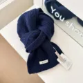 Classic navy blue cable knit wool scarf for women, warm winter neck warmer and stylish accessory. - Navy Blue