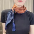 Two-tone silk scarf detail, stylish brown and navy blue design with elegant tassel pendant. - One Size / Navy Blue and Orange