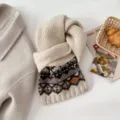 Cozy winter knitted scarf featuring a classic Fair Isle jacquard pattern and rib trim. - Off White