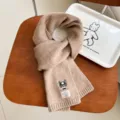Winter wool-blend knitted scarf with cute dog embroidery and cozy thick design for cold weather. - Camel