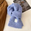 Detailed view of the soft knitted wool scarf in light blue, cozy winter warm winter scarf. - 160cm / Blue