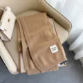 Sciarpa in maglia di lana color cammello, morbida e calda per la stagione invernale donna. - cammello chiaro
